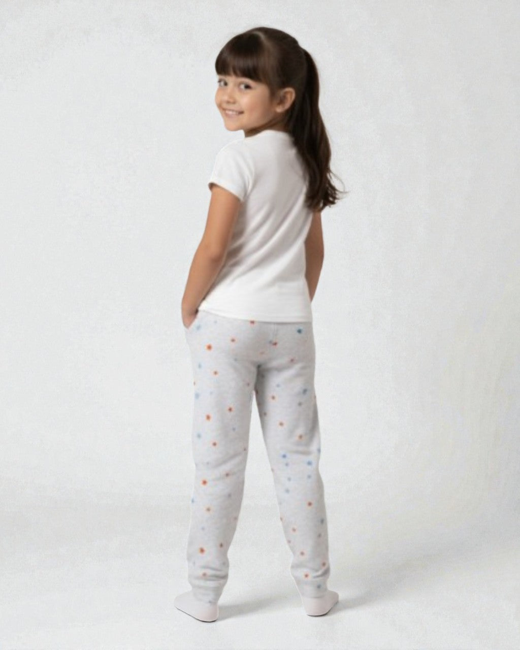 Girl back view wearing pure cotton grey stars print pyjama kids sleepwear FNS India.
