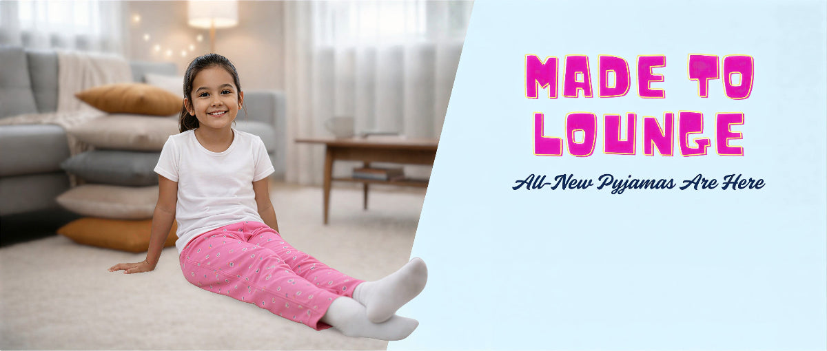Child sitting on the floor with text 'Made to Lounge' and 'All-New Pyjamas Are Here'.