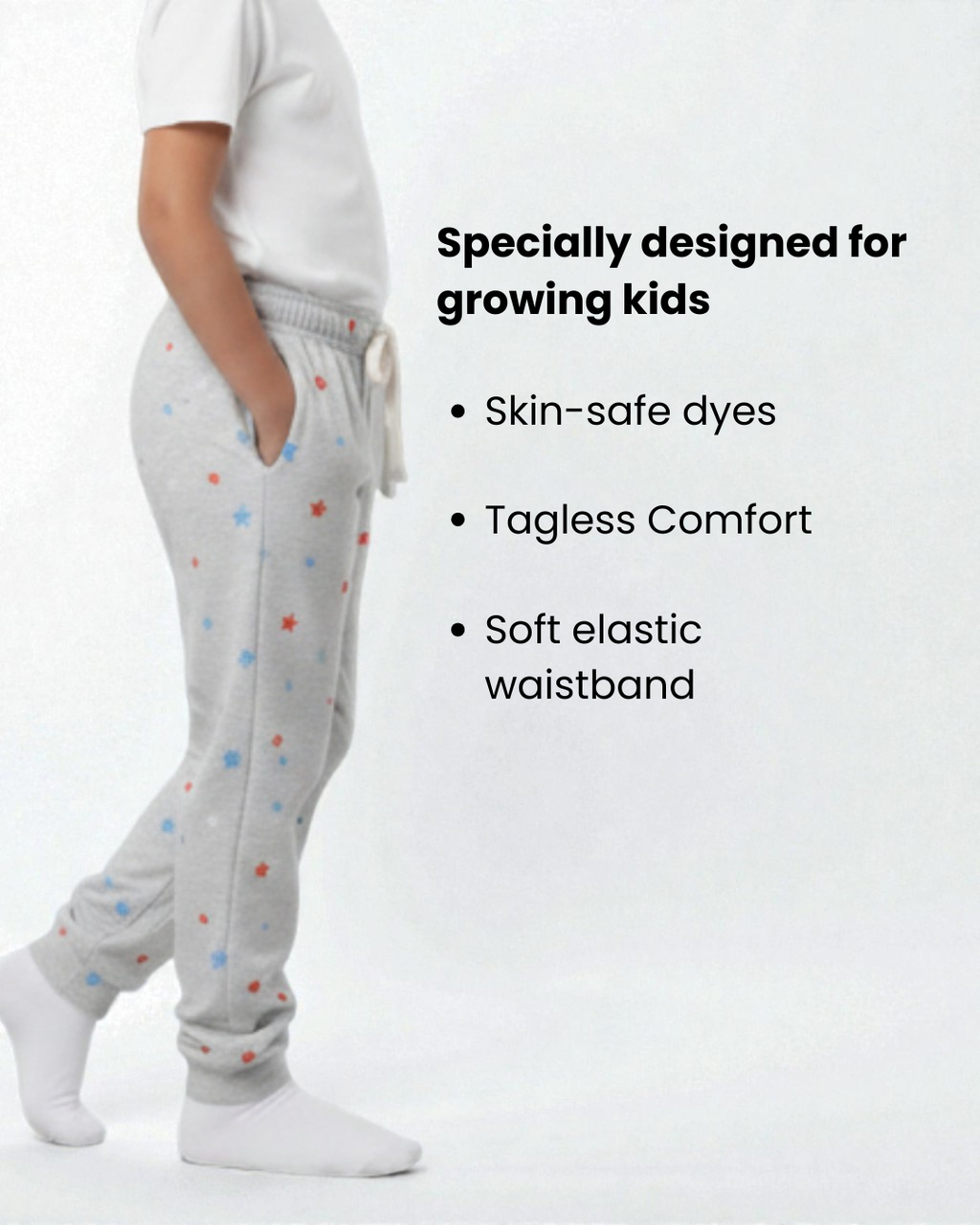 Girl side view wearing pure cotton grey stars print pyjama kids sleepwear FNS India with text about product features.