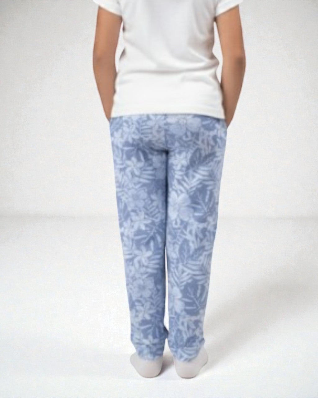 Girl back view wearing pure cotton blue flower print pyjama kids sleepwear FNS India.
