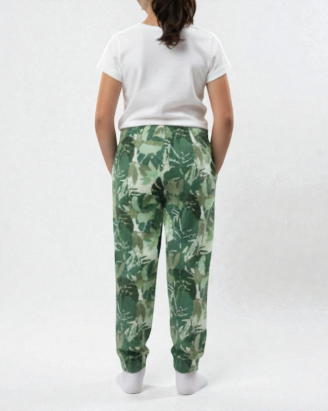 Girl back view wearing pure cotton green camouflage print pyjama kids sleepwear FNS India.
