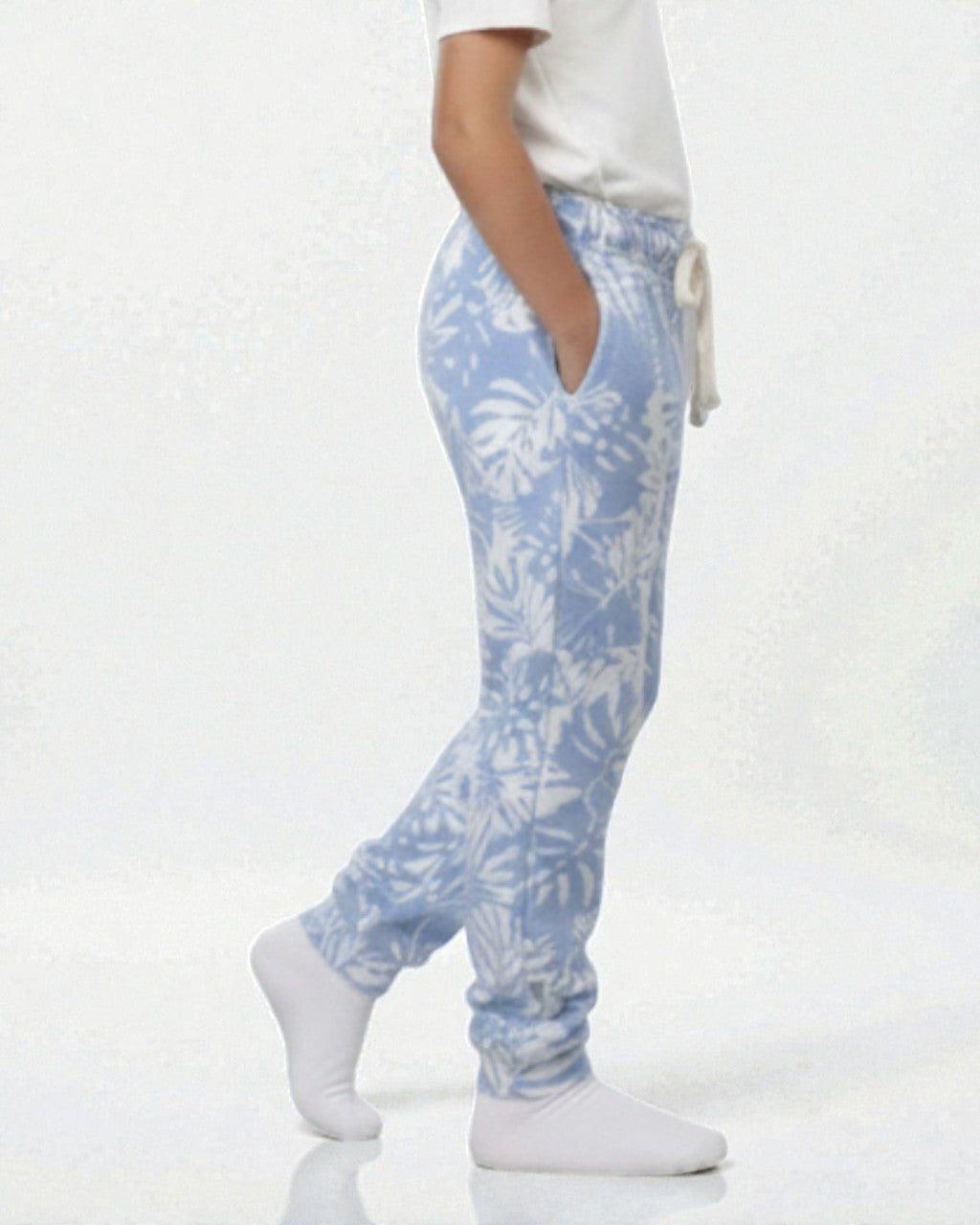 Girl side view wearing pure cotton blue flower print pyjama kids sleepwear FNS India.