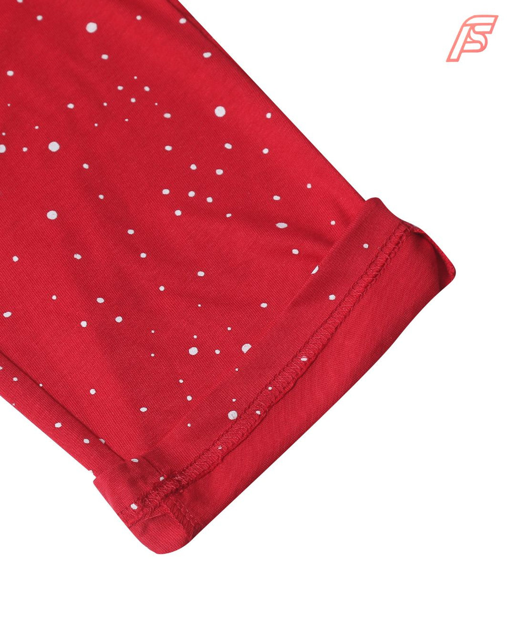 Red fabric with white polka dots on a white background