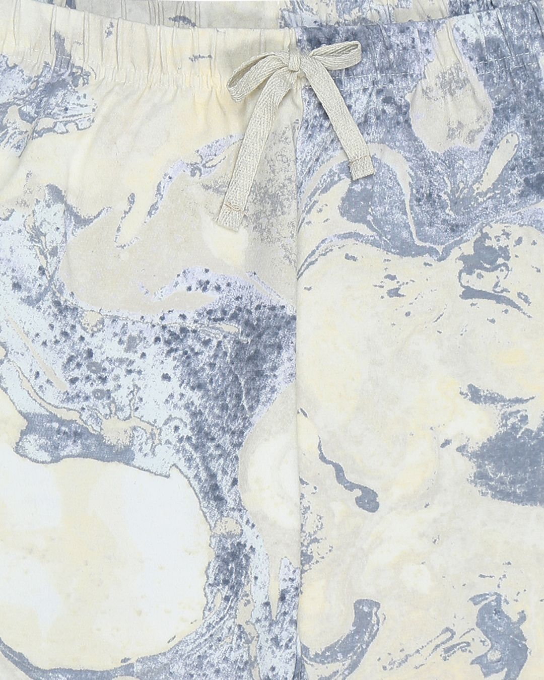 Close up of white and blue tie-dye pyjama kids sleepwear FNS India.