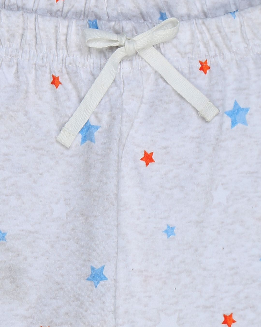 Close up of pure cotton grey fabric with stars print pyjama.